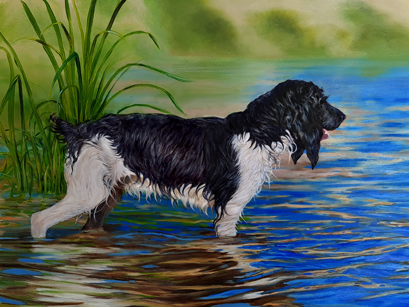 Portrait of a spaniel dog at a lake edge in a landscape painted in oils by UK pet portrait artist Pippa Elton